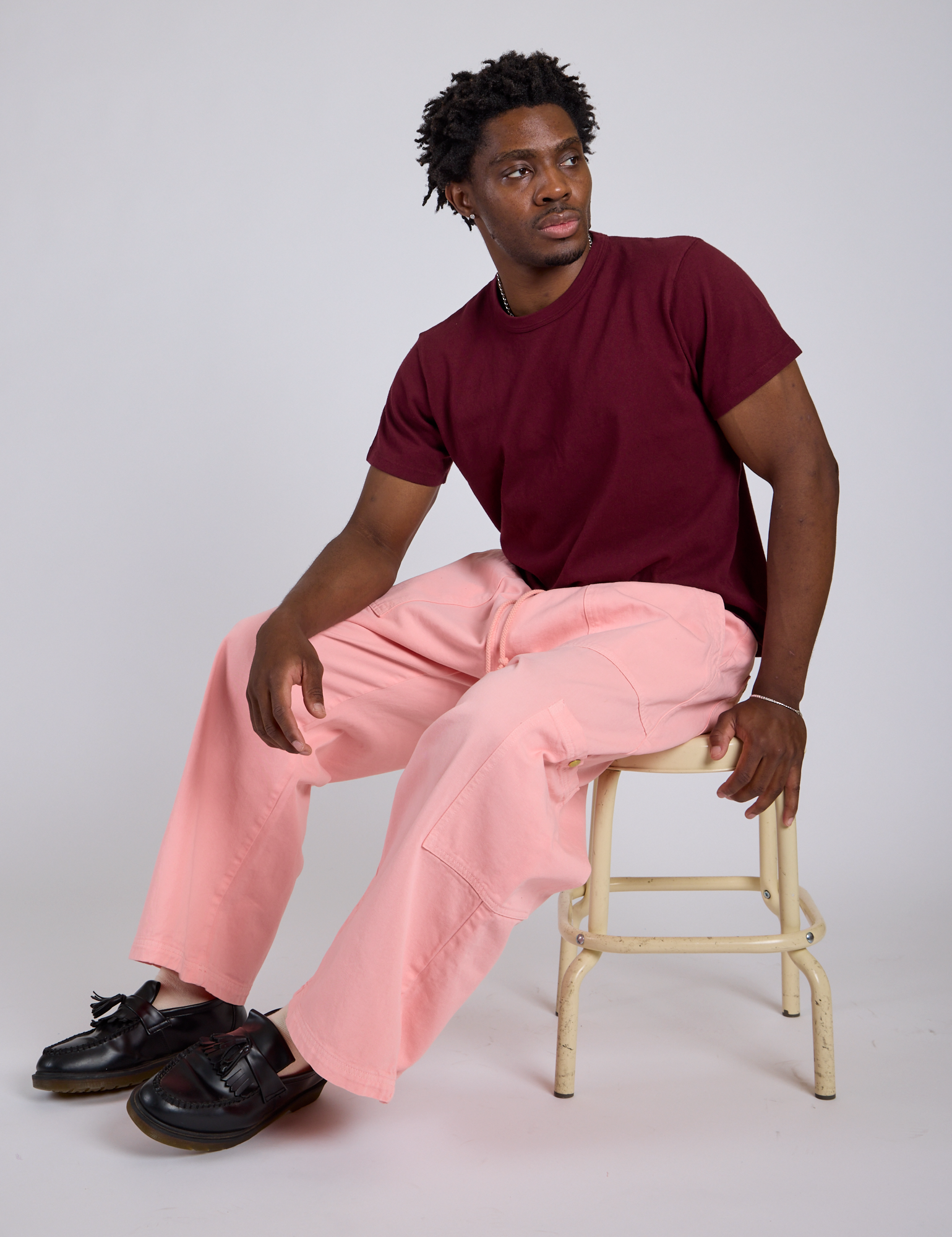Drop Pocket Cargo Pants in Baby Pink and red wine Organic Vintage tee on Isaac