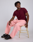 Drop Pocket Cargo Pants in Baby Pink and red wine Organic Vintage tee on Isaac
