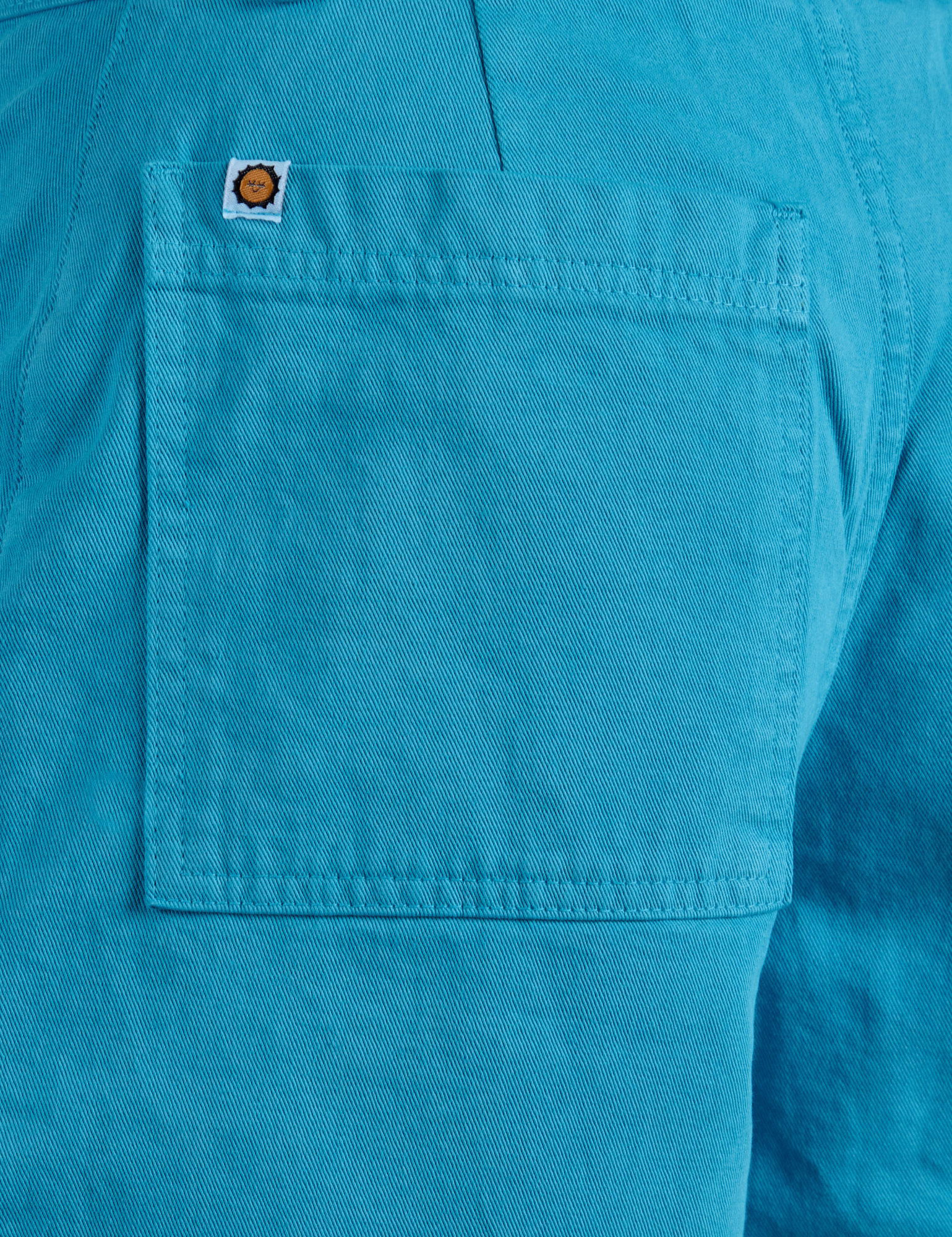 Longline Work Shorts in Hawaiian Blue back pocket close up