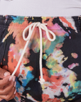 Sweat Shorts in Rainbow Magic Waters front close up. Drawstring is tied in a bow.
