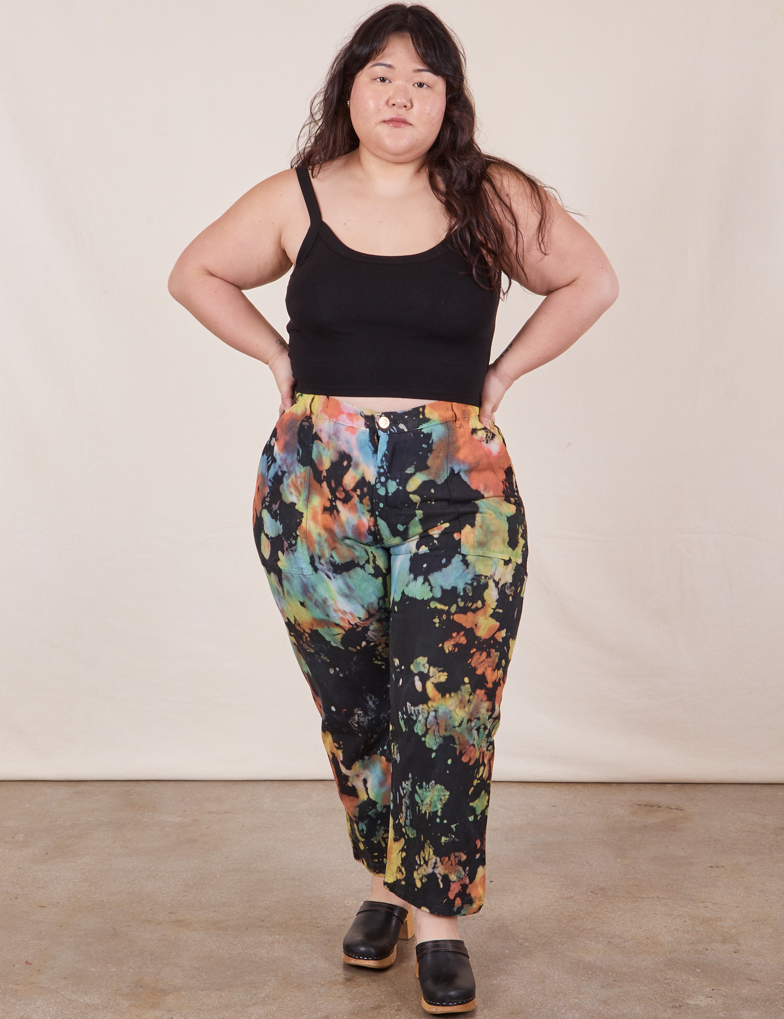 Ashley is wearing Rainbow Magic Waters Work Pants and black Cropped Cami