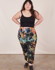 Ashley is wearing Rainbow Magic Waters Work Pants and black Cropped Cami