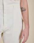 Short Sleeve Jumpsuit in Vintage Tee White front close up on Quinn