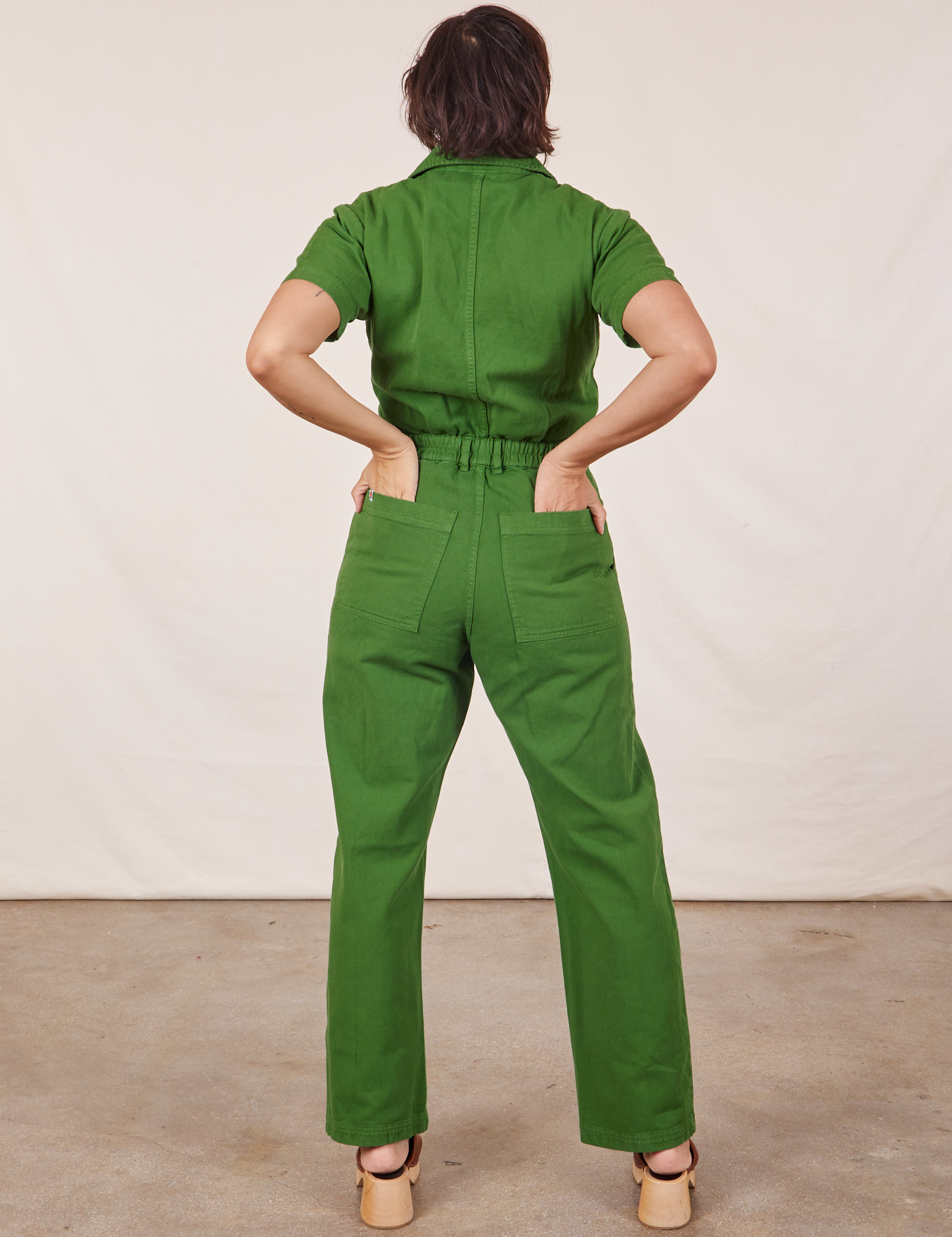 Back view of Short Sleeve Jumpsuit in Lawn Green worn by Tiara