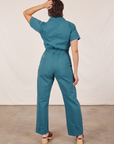 Back view of Short Sleeve Jumpsuit in Marine Blue worn by Tiara