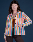 Alex is 5’8” and wearing P Stripe Work Jacket in Rainbow Stripe