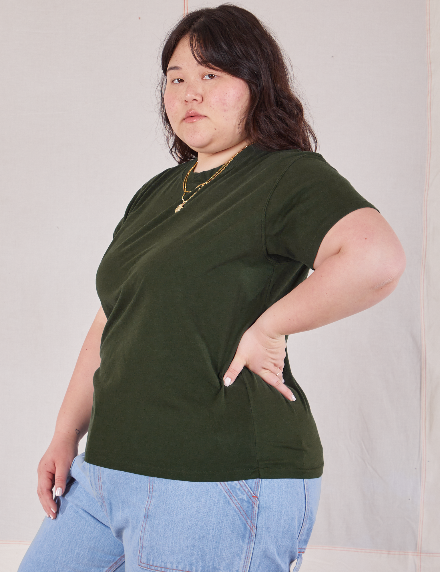 Organic Vintage Tee in Swamp Green angled front view on Ashley