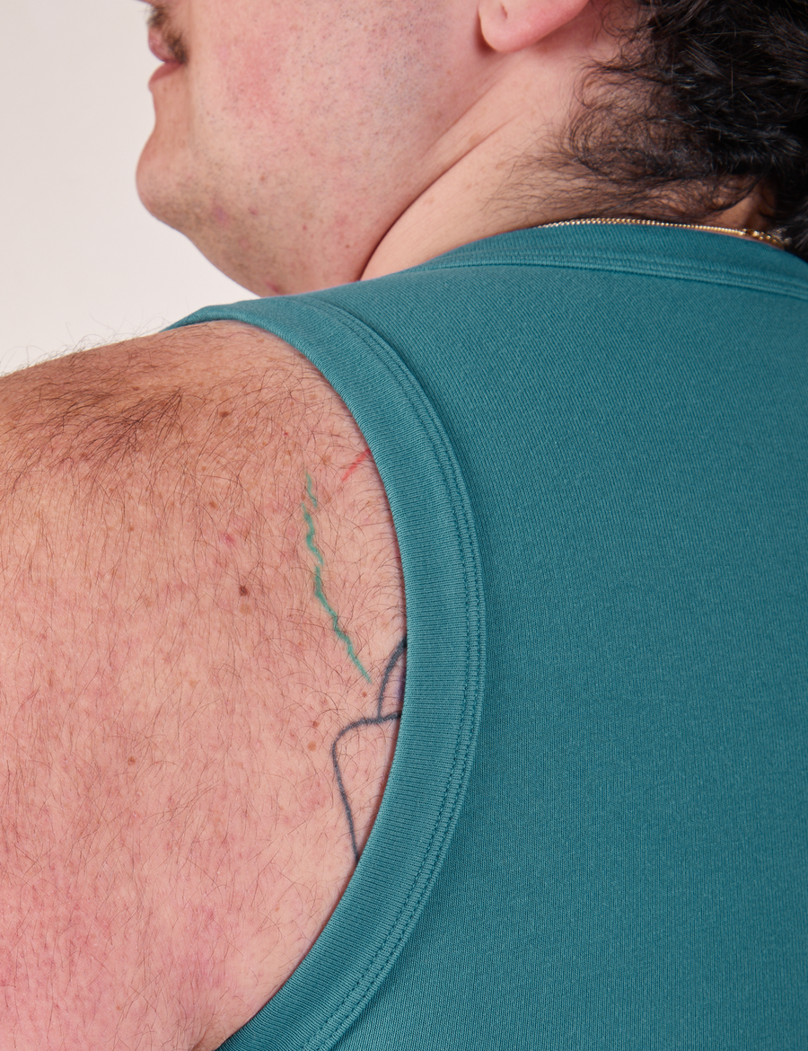 Upper back shoulder close up of Tank Top in Marine Blue worn by Sam