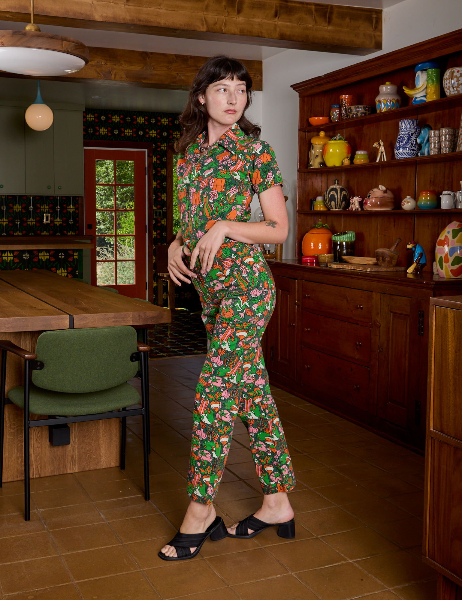Short Sleeve Jumpsuit in Kitchen Collection side view on Alex