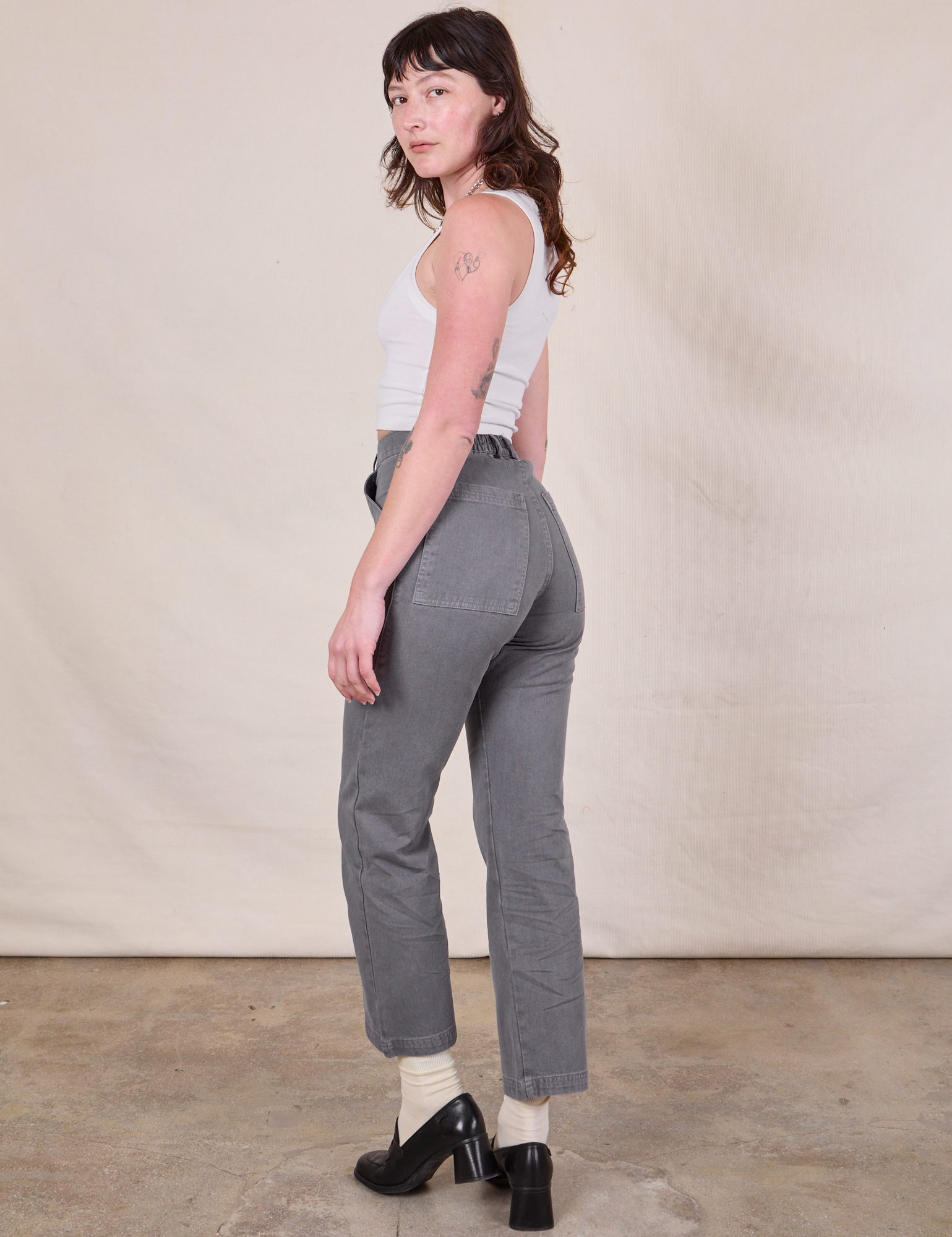 Angled back view of Work Pants in Washed Grey on Alex