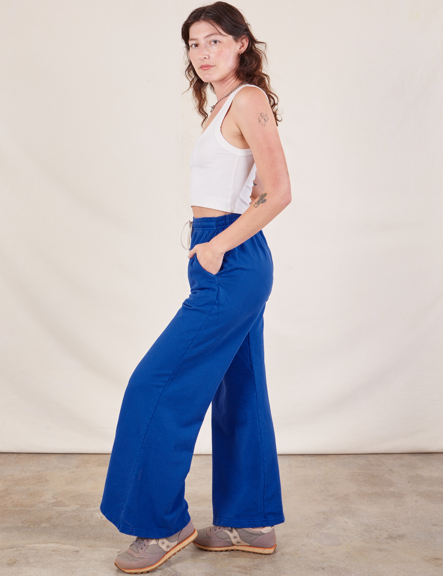 Wide Leg Sweat Pants in Royal Blue side view on Alex