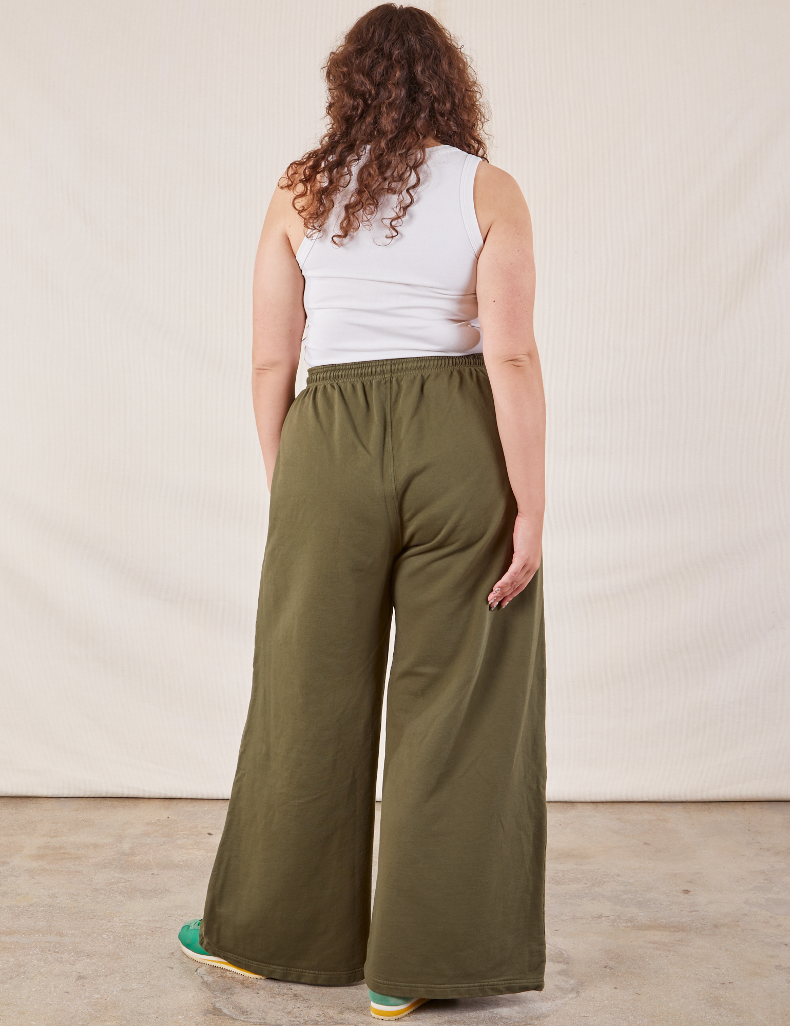 Wide Leg Sweat Pants in Surplus Green back view on Ryan