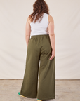 Wide Leg Sweat Pants in Surplus Green back view on Ryan