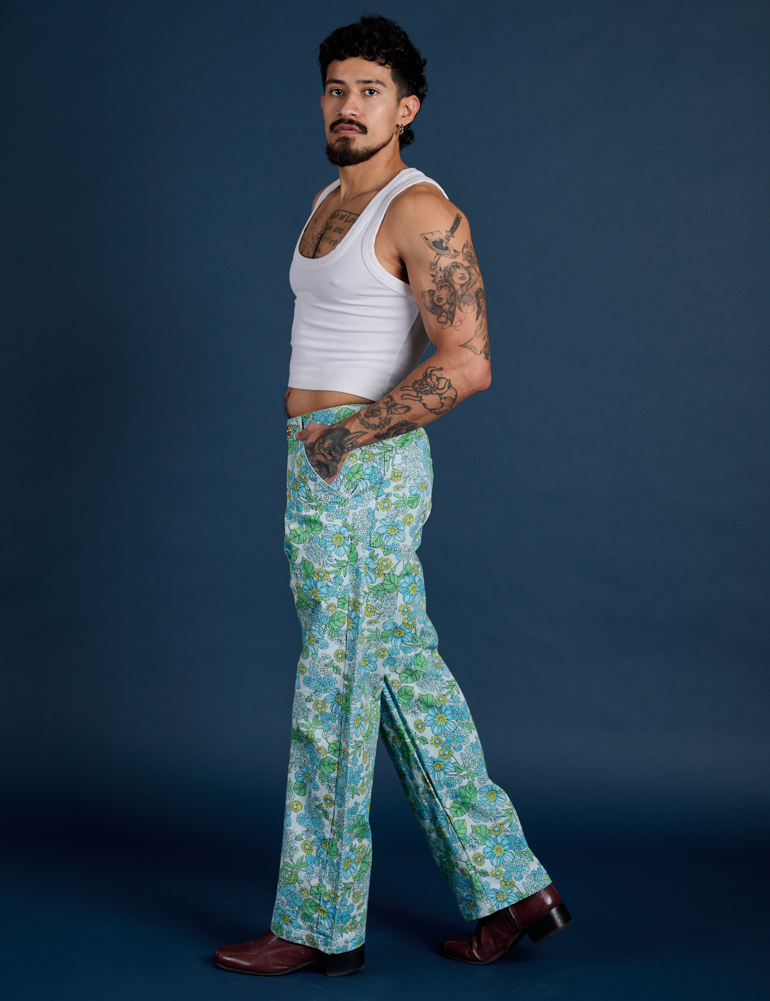 Side view of Winter Floral Print Work Pants and Cropped Tank in Vintage Tee White on Jesse