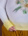 Floral Long Sleeve Baby Tee in Yellow bottom and sleeve close up on Sam