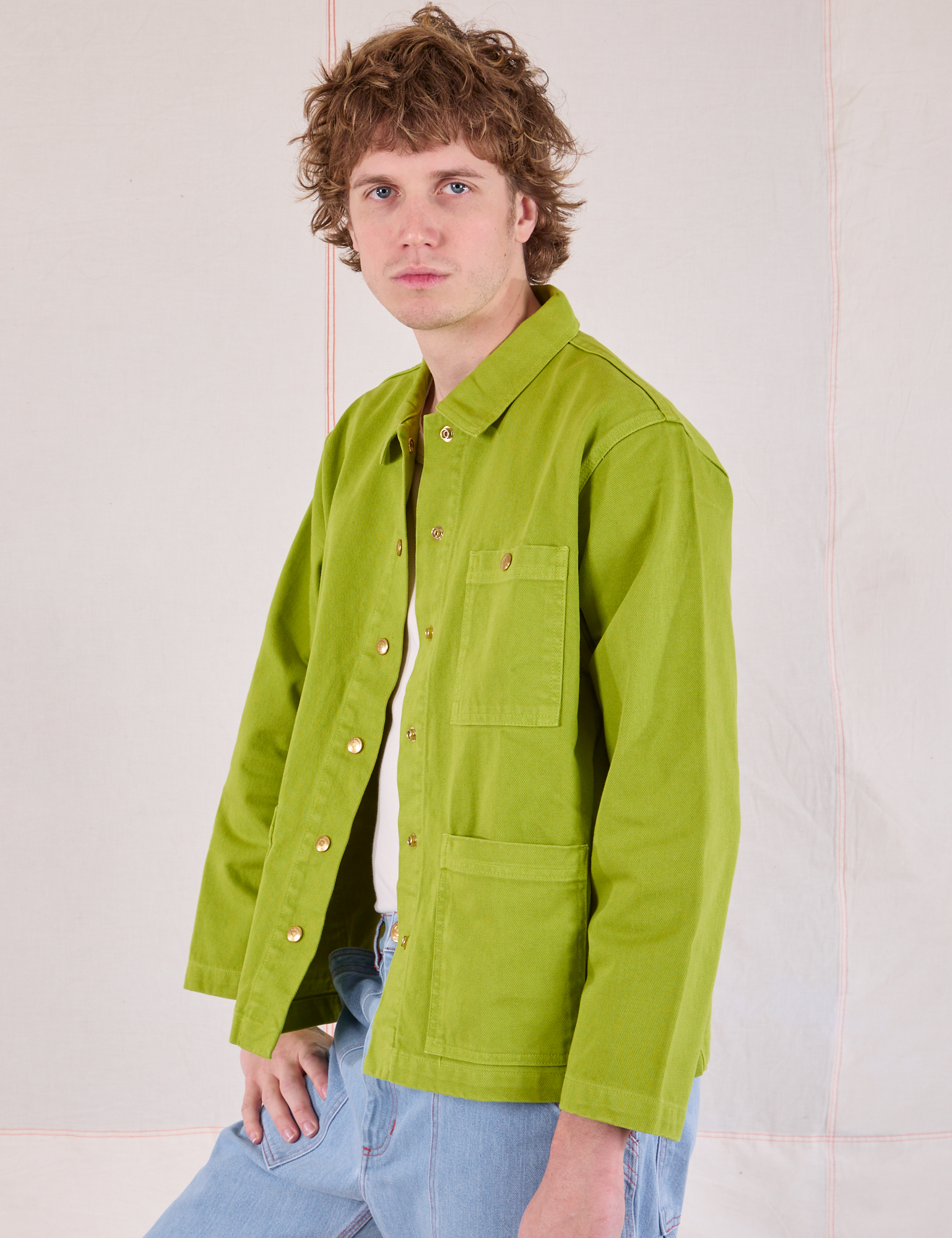 Denim Work Jacket in Gross Green angled front view on Quinn