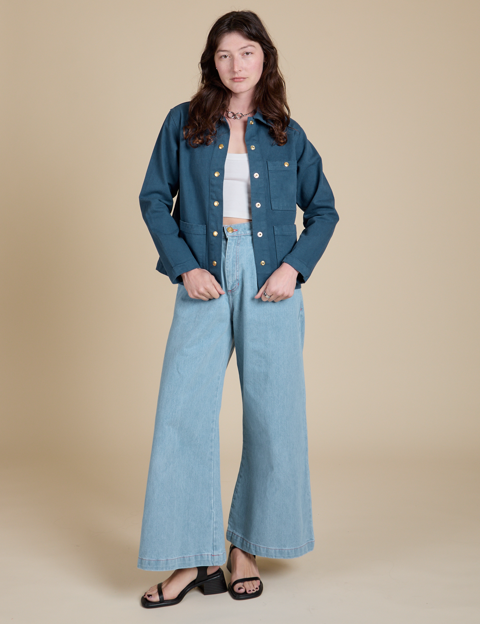 Alex is wearing Denim Work Jacket in French Blue and light wash Indigo Wide Leg Trousers
