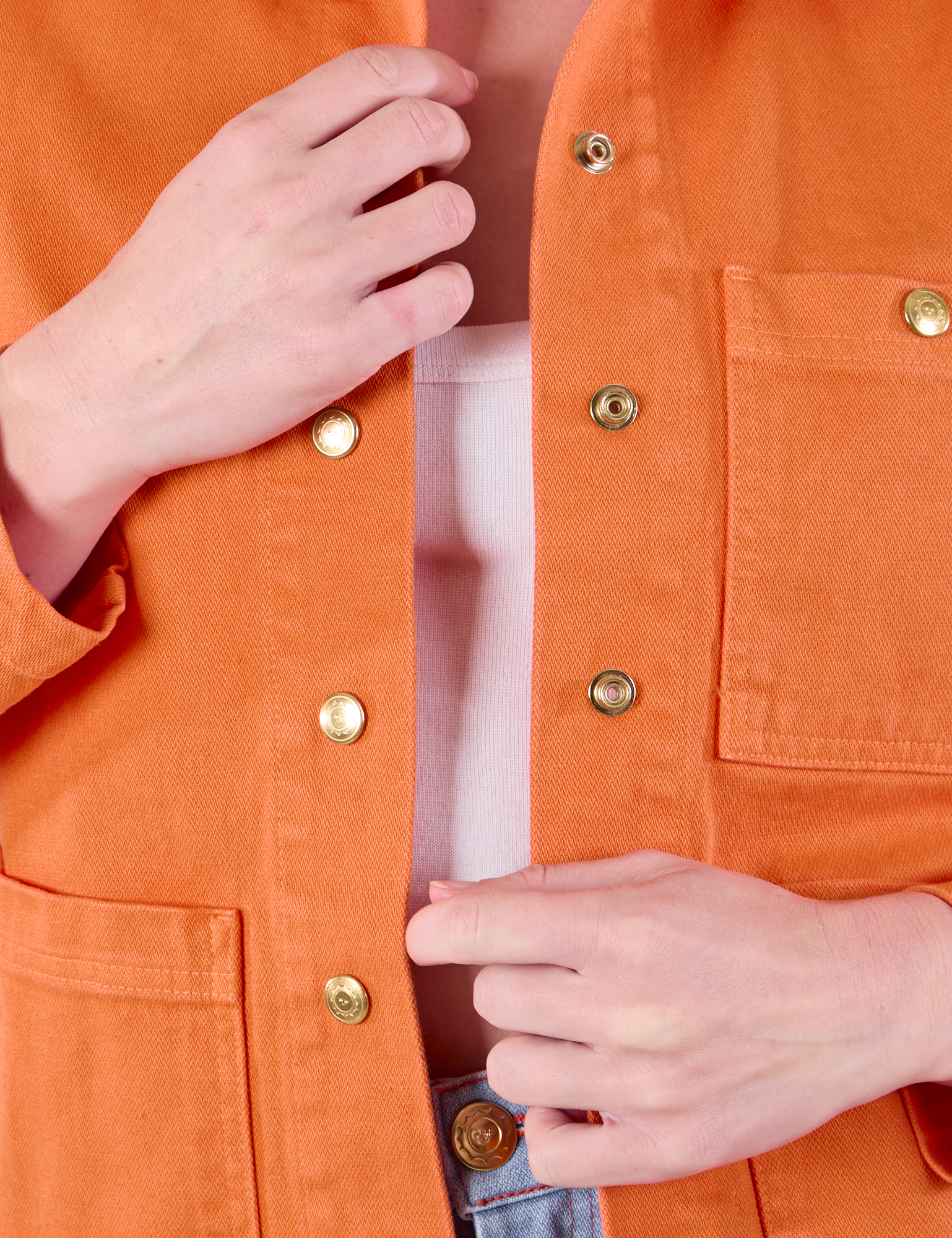 Denim Work Jacket in Construction Orange front close up on Alex