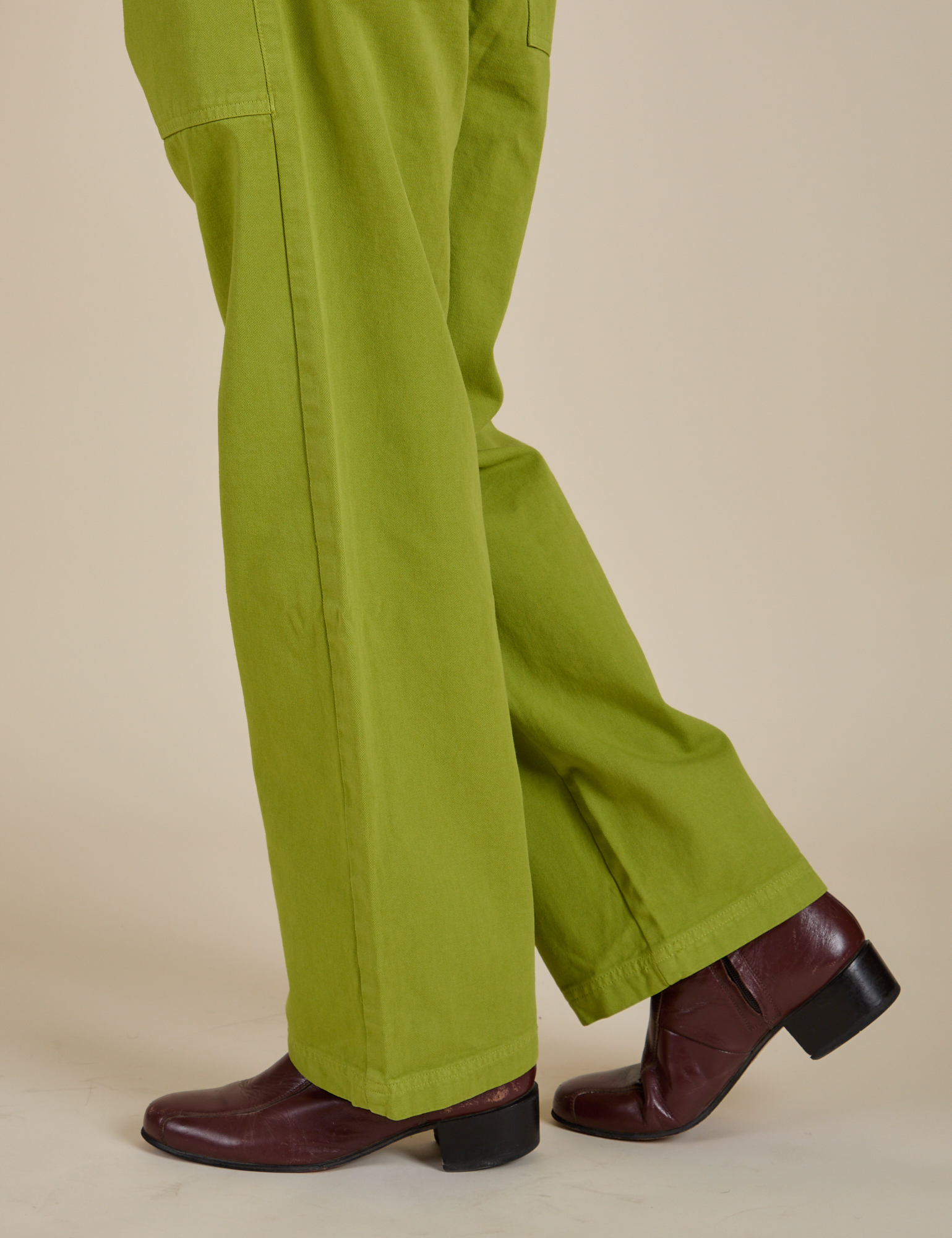 Pant leg side view of Work Pants in Gross Green on Jesse