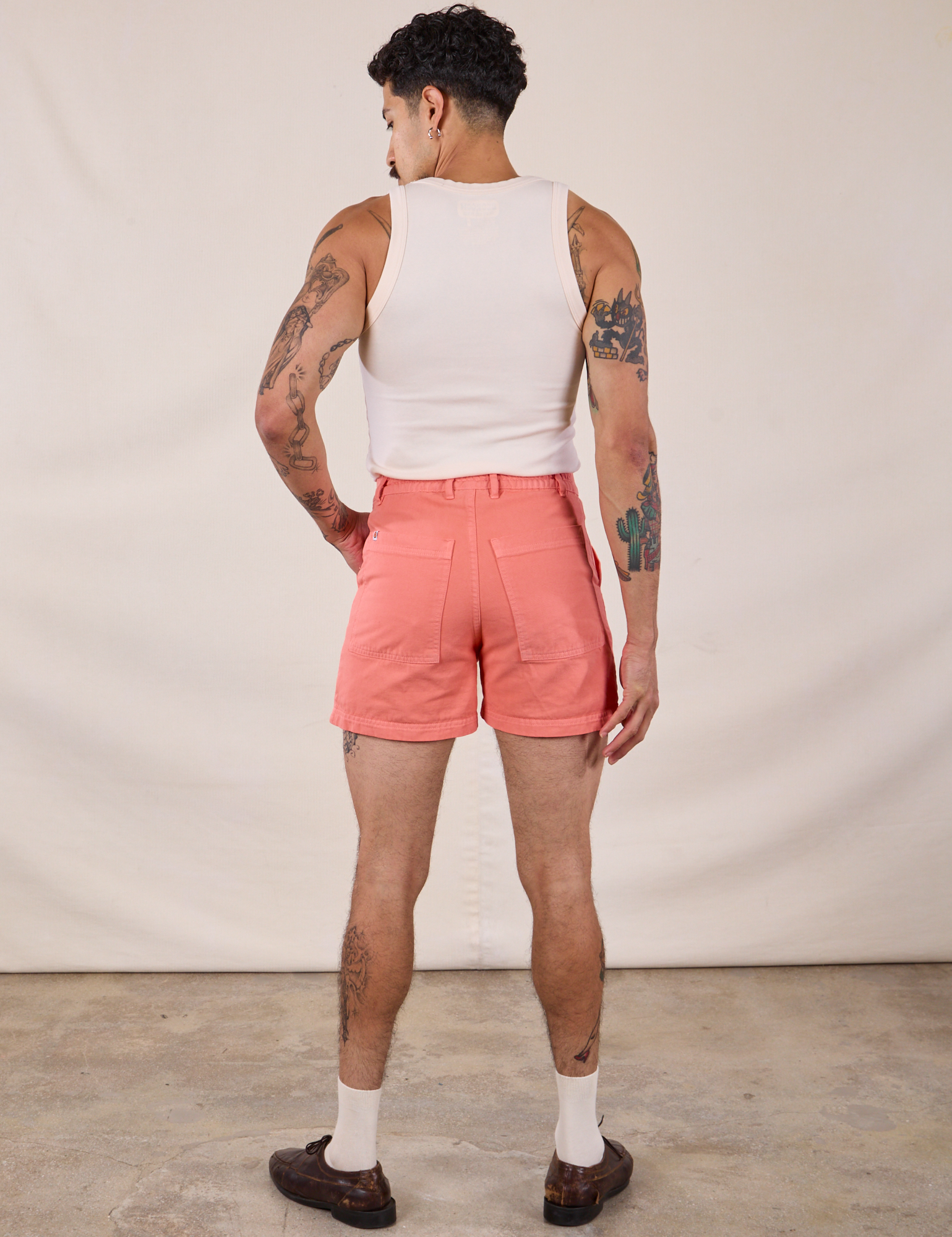 Back view of Classic Work Shorts in Flamingo Pink and Tank Top in Vintage Tee Off-White on Jesse