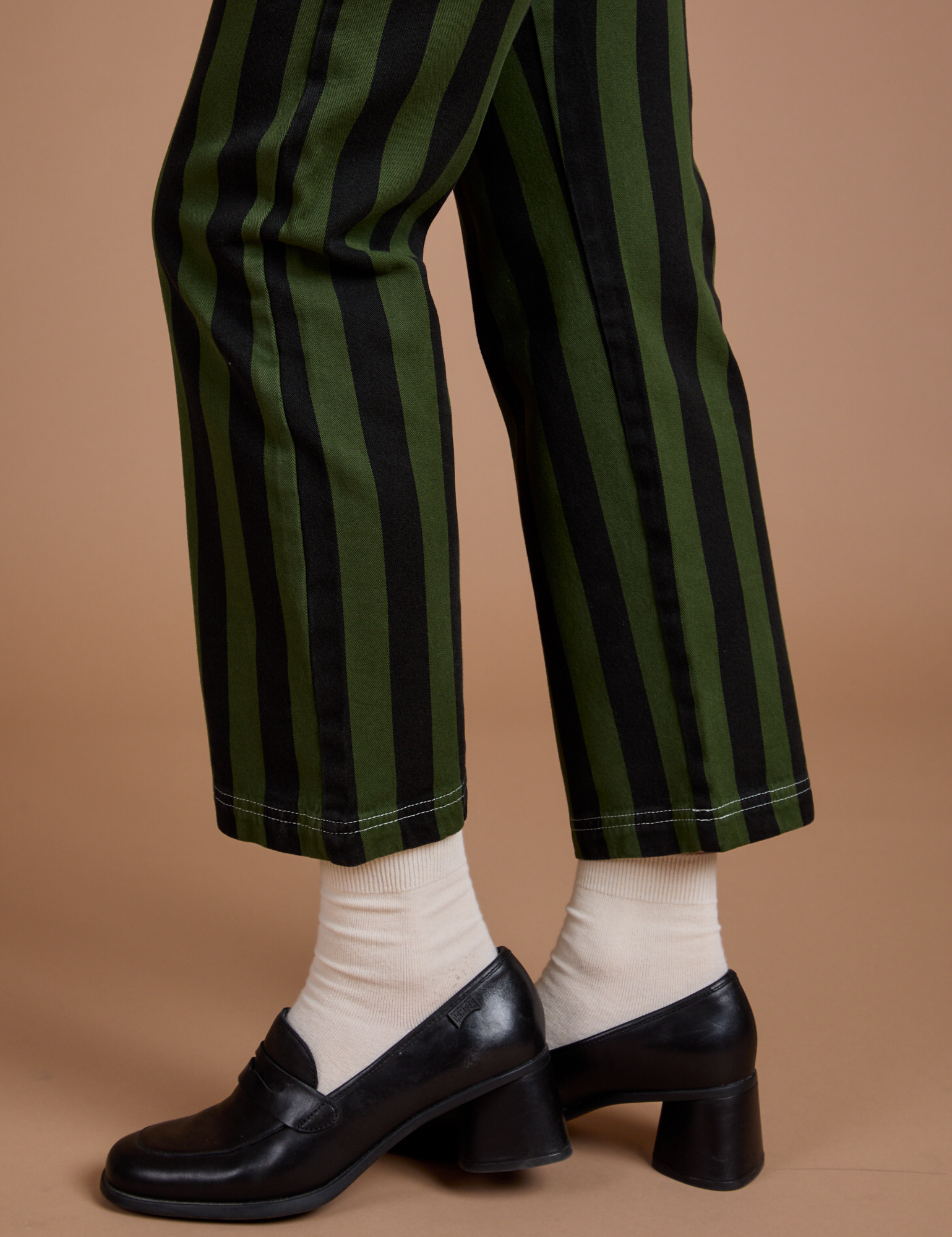 Black Stripe Work Pants in Evergreen pant leg side view close up on Alex