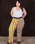 Ashley is wearing Mixed Stripe Work Pants and a Tank Top in vintage tee off-white