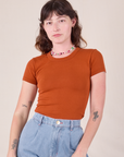 Alex is 5'8 and wearing P Baby Tee in Burnt Terracotta