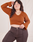 Ashley is wearing L Bell Sleeve Top in Burnt Terracotta paired with espresso brown Western Pants