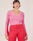 Tiara is wearing S Bell Sleeve Top in Bubblegum Pink paired with hot pink Work Pants