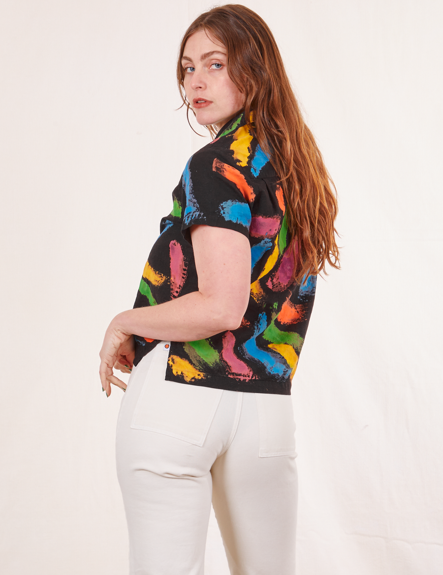 Side view of Pantry Button Up in Paint Stroke and vintage off-white Western Pants worn by Allison