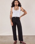 Jesse is 5'8" and wearing XS Work Pants in Black paired with a Cropped Tank in vintage tee off-white