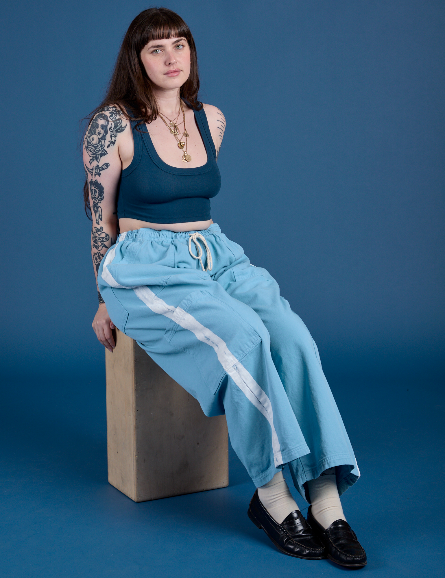 Painted Drop Pocket Cargo Pants in Baby Blue and lagoon Mini Tank worn by Sydney