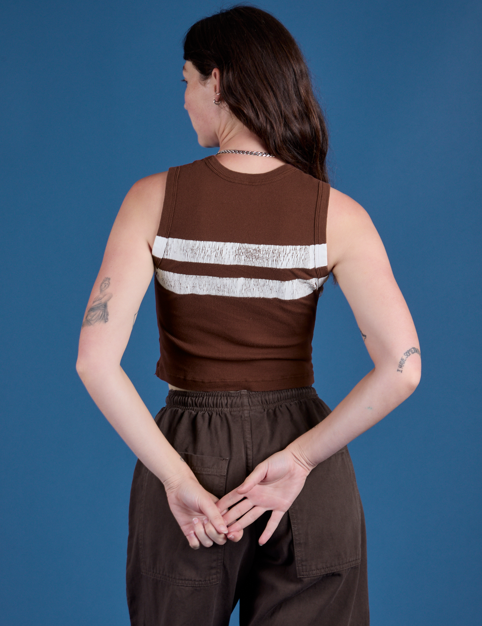 Painted Muscle Tee in Fudgesicle Brown back view on Alex
