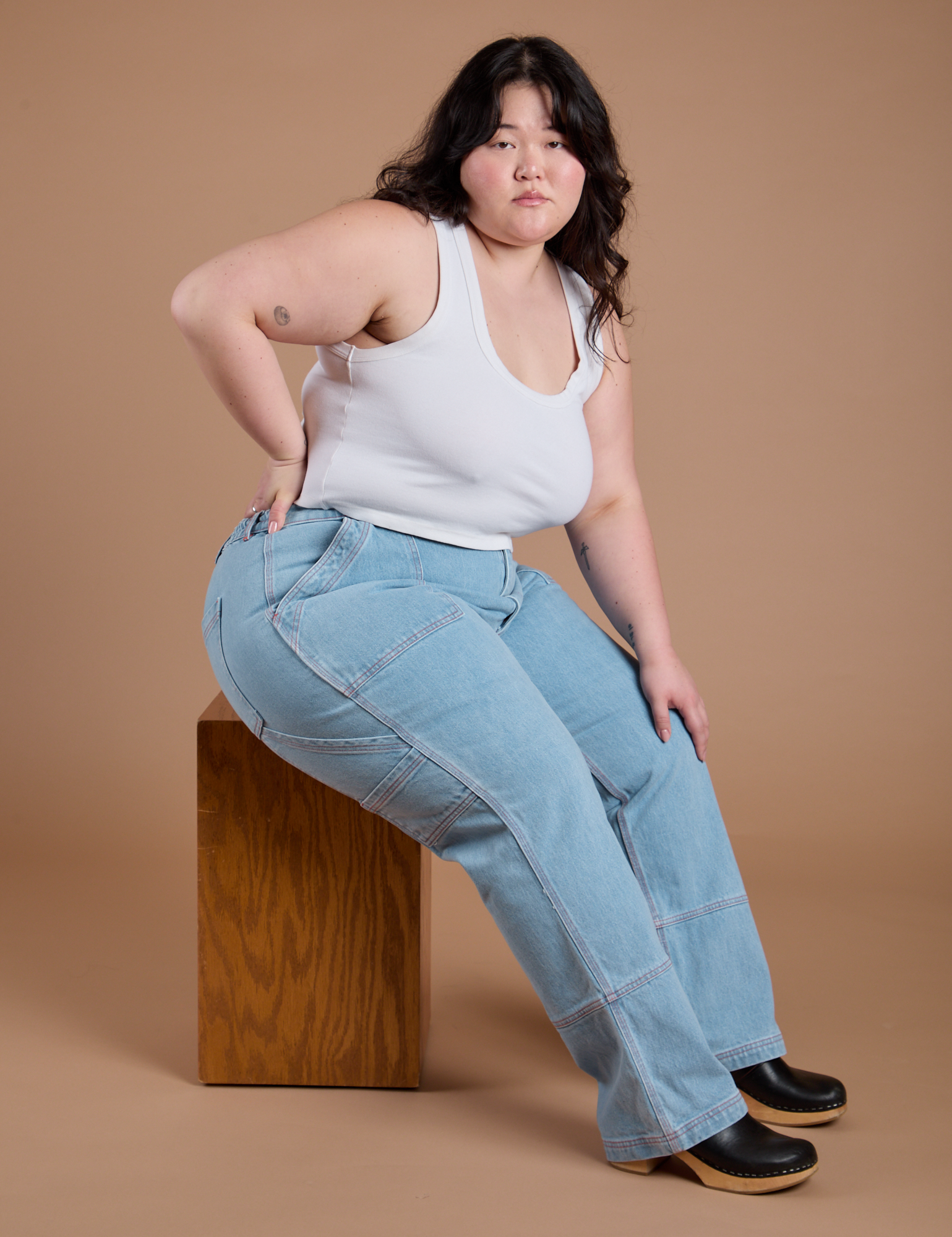Carpenter Jeans in Light Wash and Cropped Tank in Vintage Tee White on Ashley
