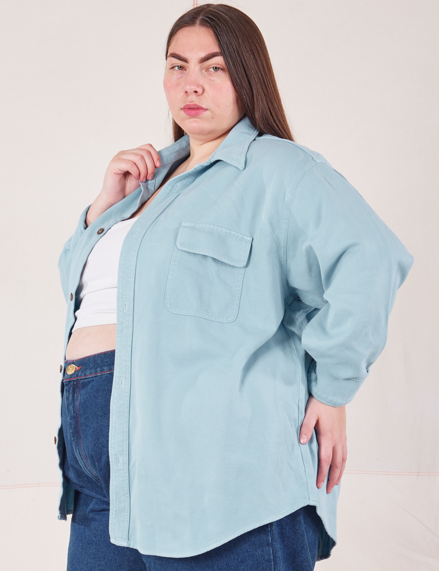 Angled front view of Flannel Overshirt in Baby Blue on Marielena