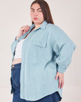 Angled front view of Flannel Overshirt in Baby Blue on Marielena