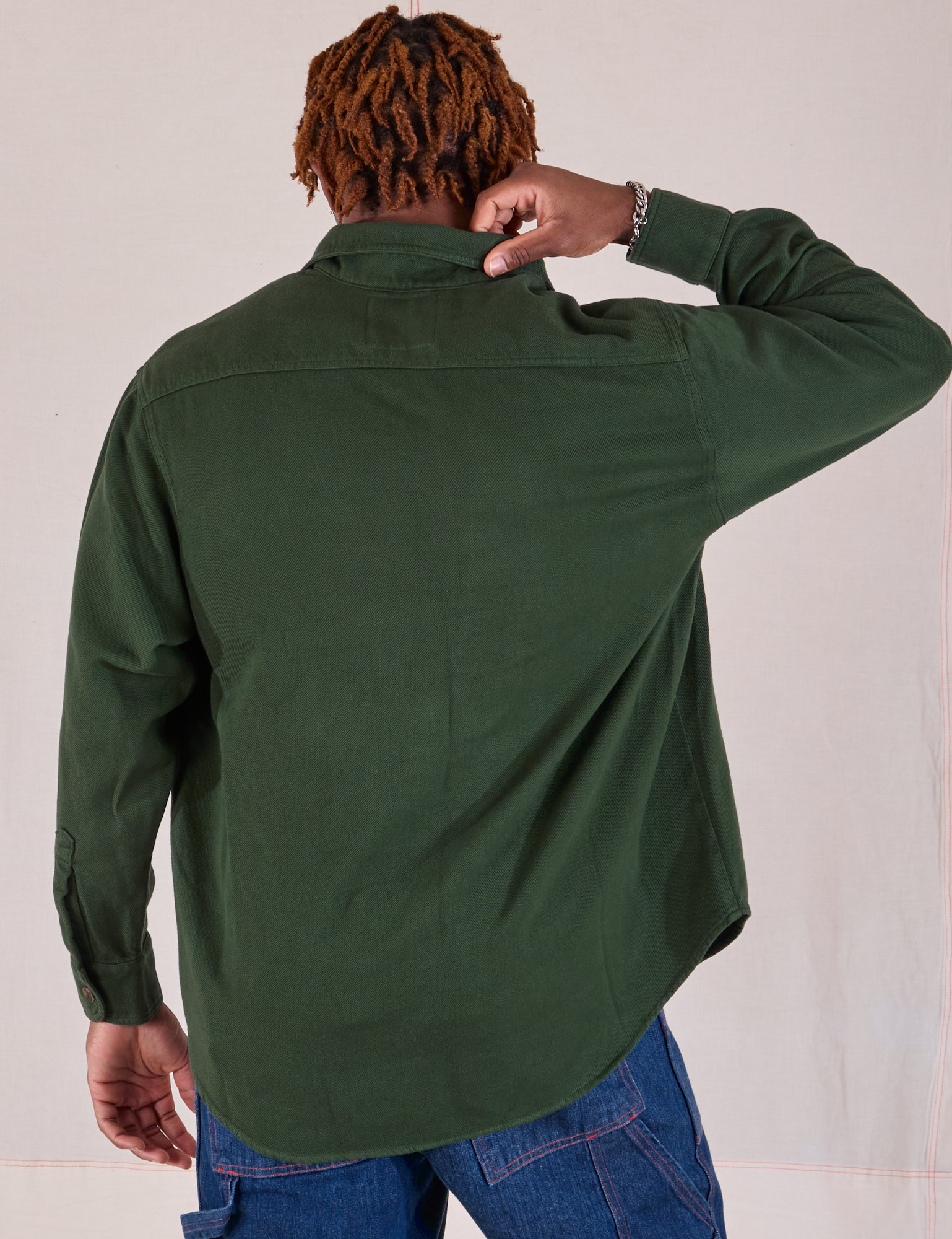 Flannel Overshirt in Swamp Green back view on Isaac