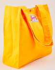 Angled view of Shopper Tote Bag in Sunshine Yellow