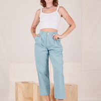 Alex is 5'8" and wearing XXS Heavyweight Trousers in Baby Blue paired with vintage off-white Cropped Cami