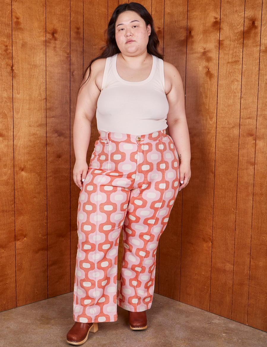 Ashley is 5'7 and wearing 1XL Western Pants in Pink Jacquard