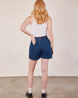 Back view of Denim Trouser Shorts in Dark Wash and Cropped Tank in vintage tee off-white on Margaret