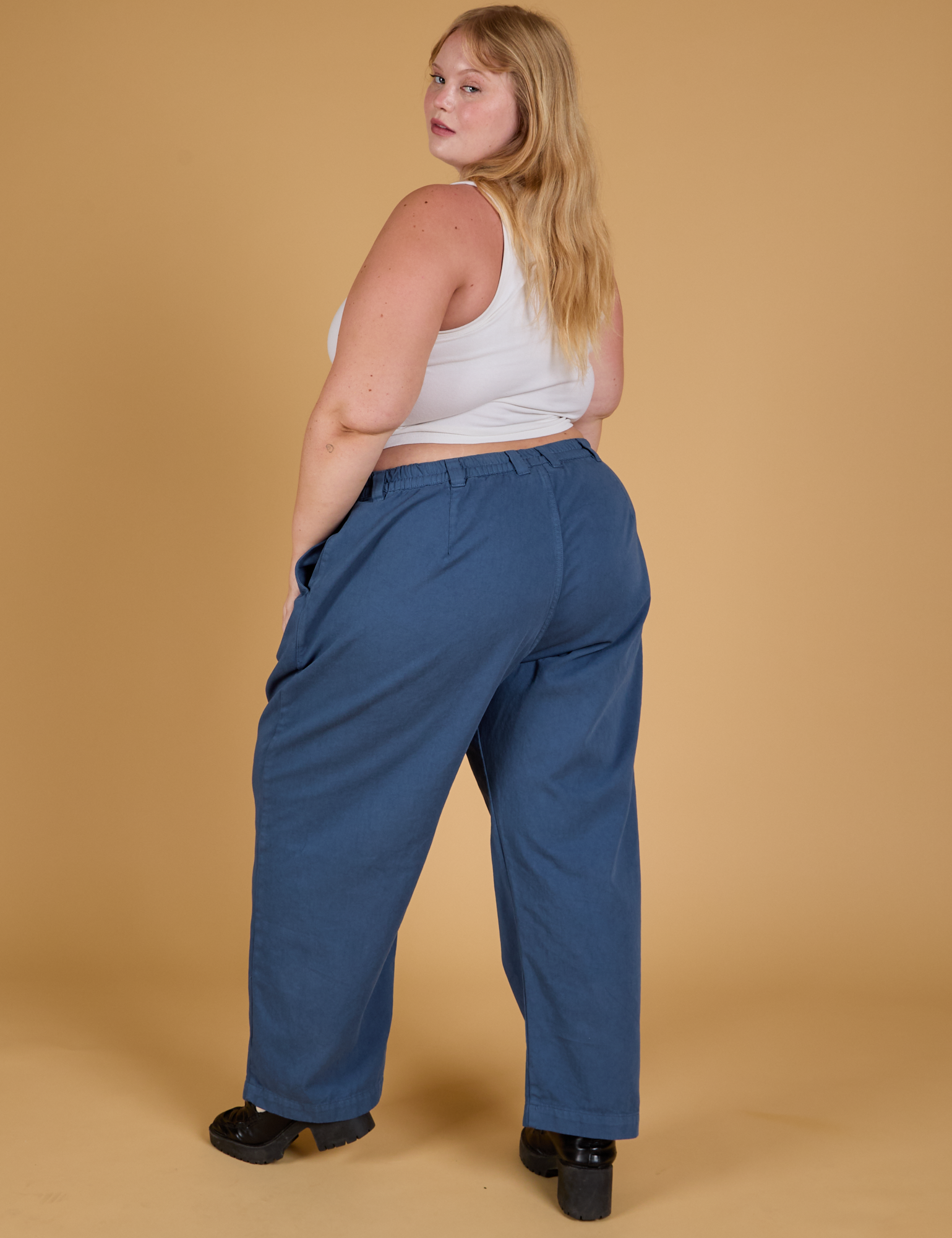 Baggy Mid-Rise Trousers in French Blue back view on Juliet