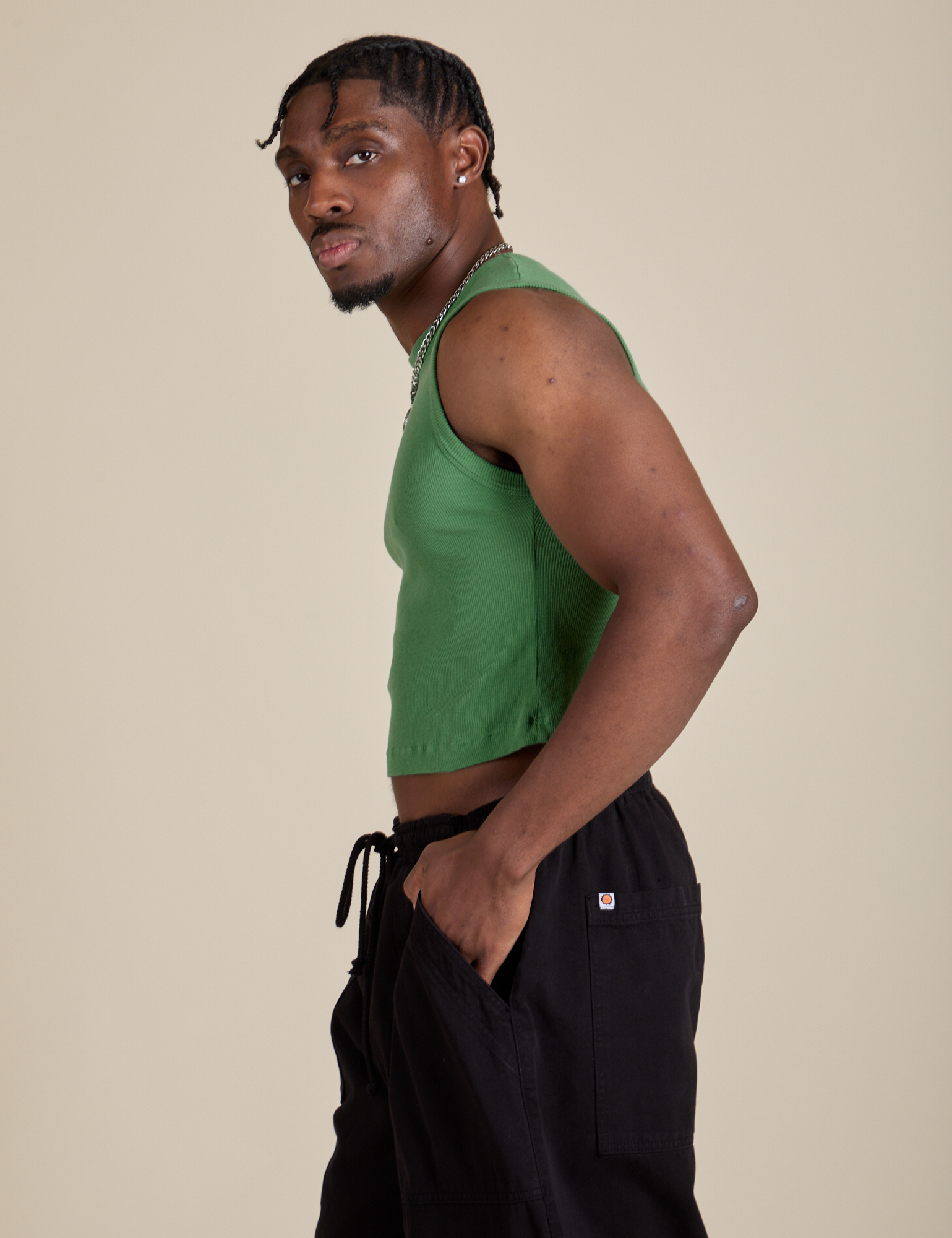 Muscle Tee in Seafoam Green side view on Isaac