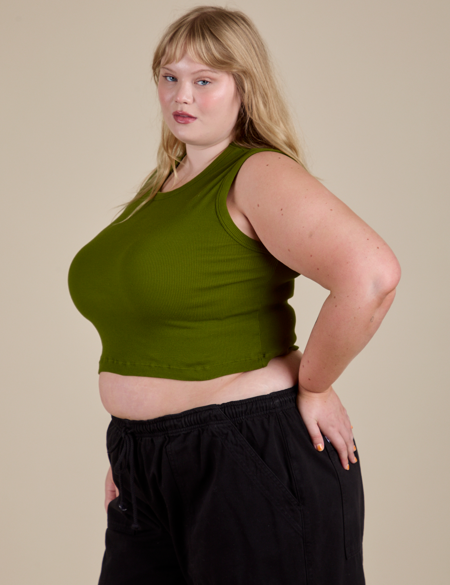 Angled front view of Muscle Tee in Summer Olive on Juliet