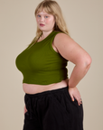 Angled front view of Muscle Tee in Summer Olive on Juliet