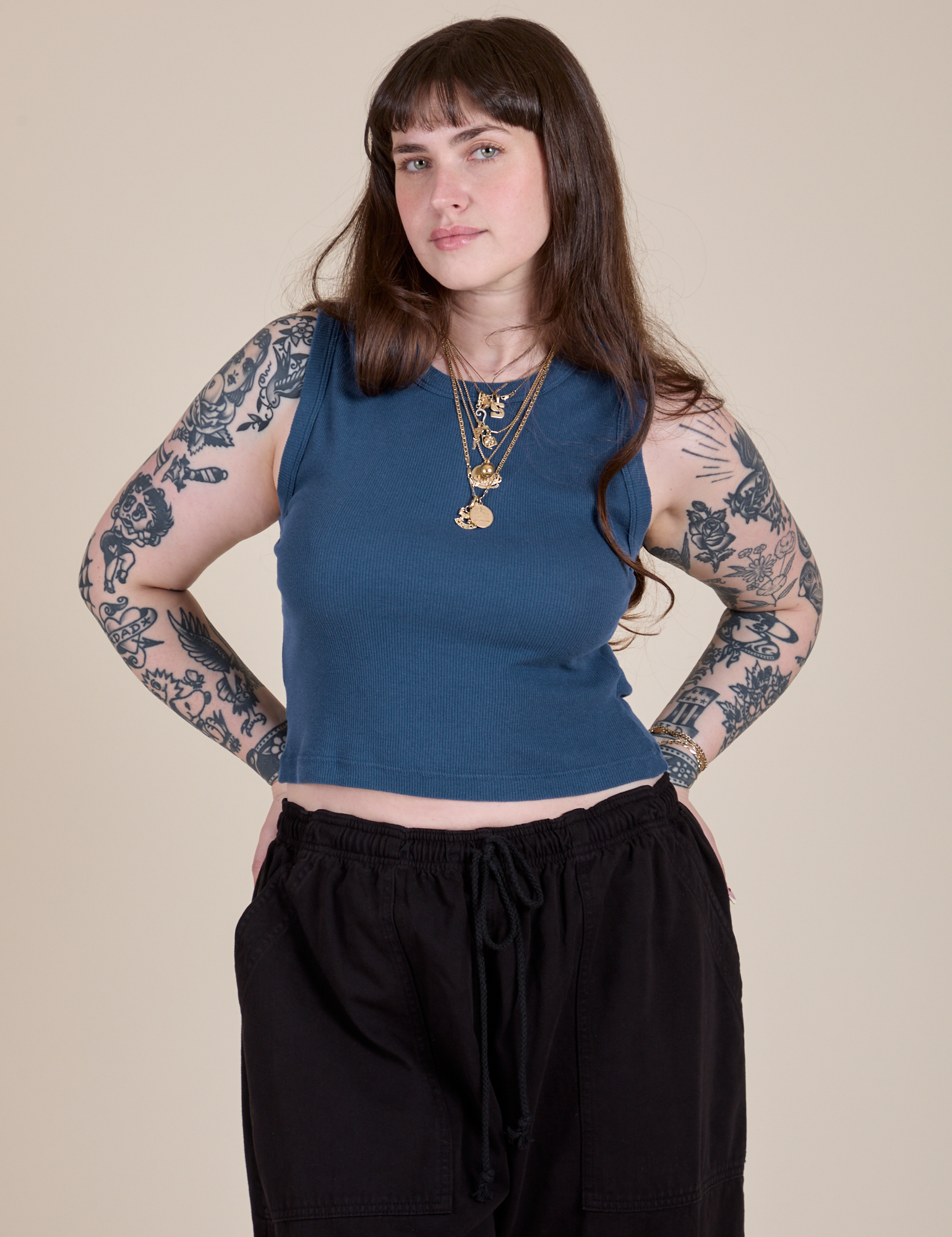 Sydney is 5'9" and wearing XXS Muscle Tee in French Blue