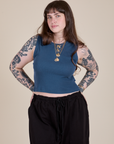 Sydney is 5'9" and wearing XXS Muscle Tee in French Blue