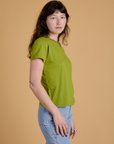 Organic Vintage Tee in Gross Green side view on Alex