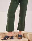 Organic Work Pants in Swamp Green pant leg close up on Mika