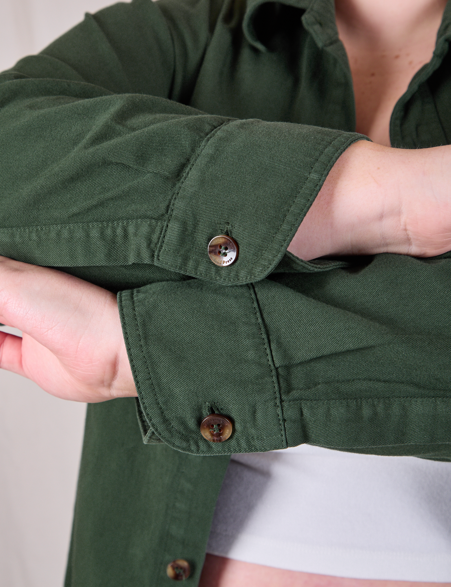 Twill Overshirt in Swamp Green cuff sleeve close up on Juliet